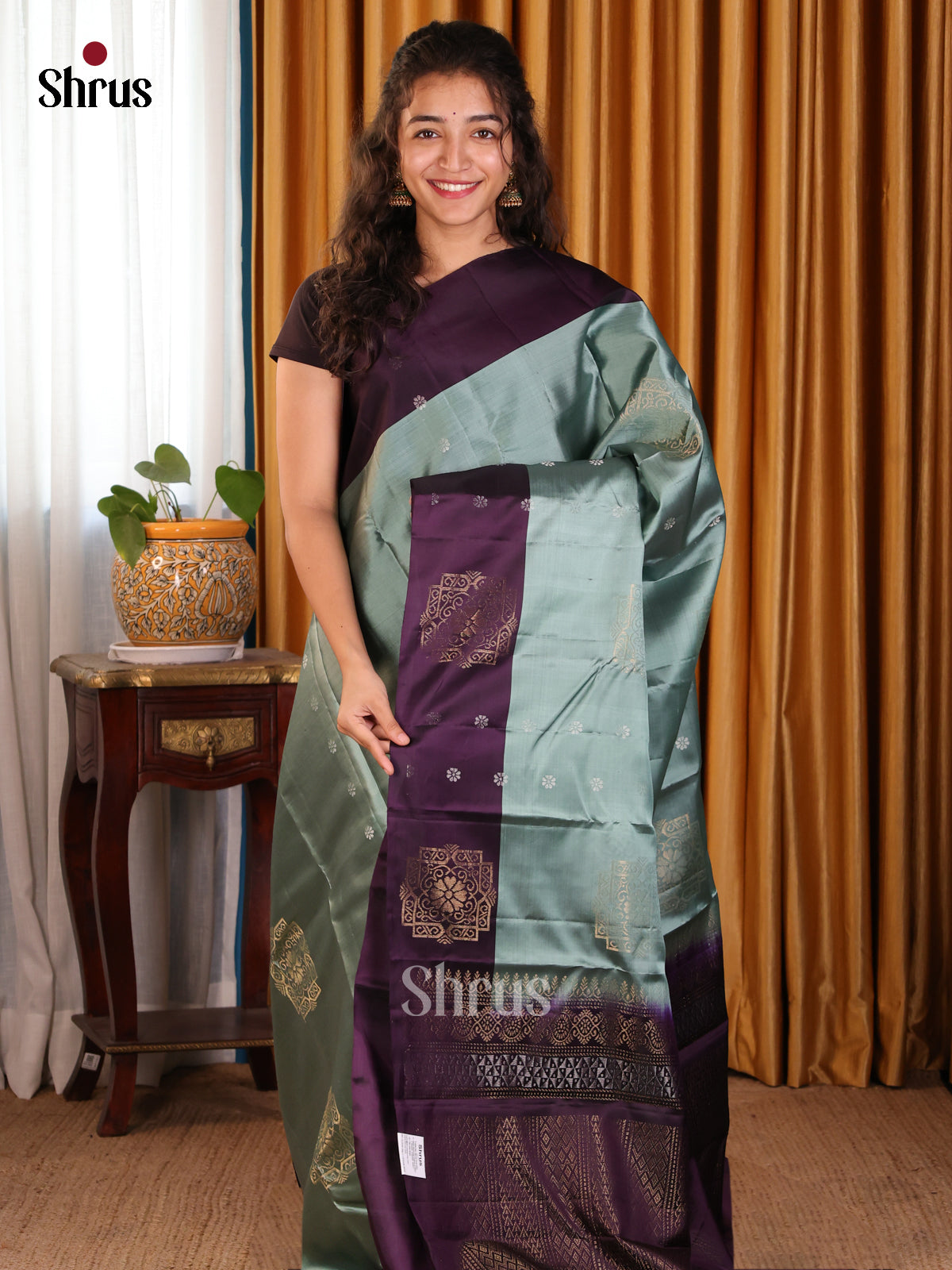 Stunning Pastel Green Softsilk-halfpure Saree with gold floral motif & silver zari butta - Shop on Shrus.com