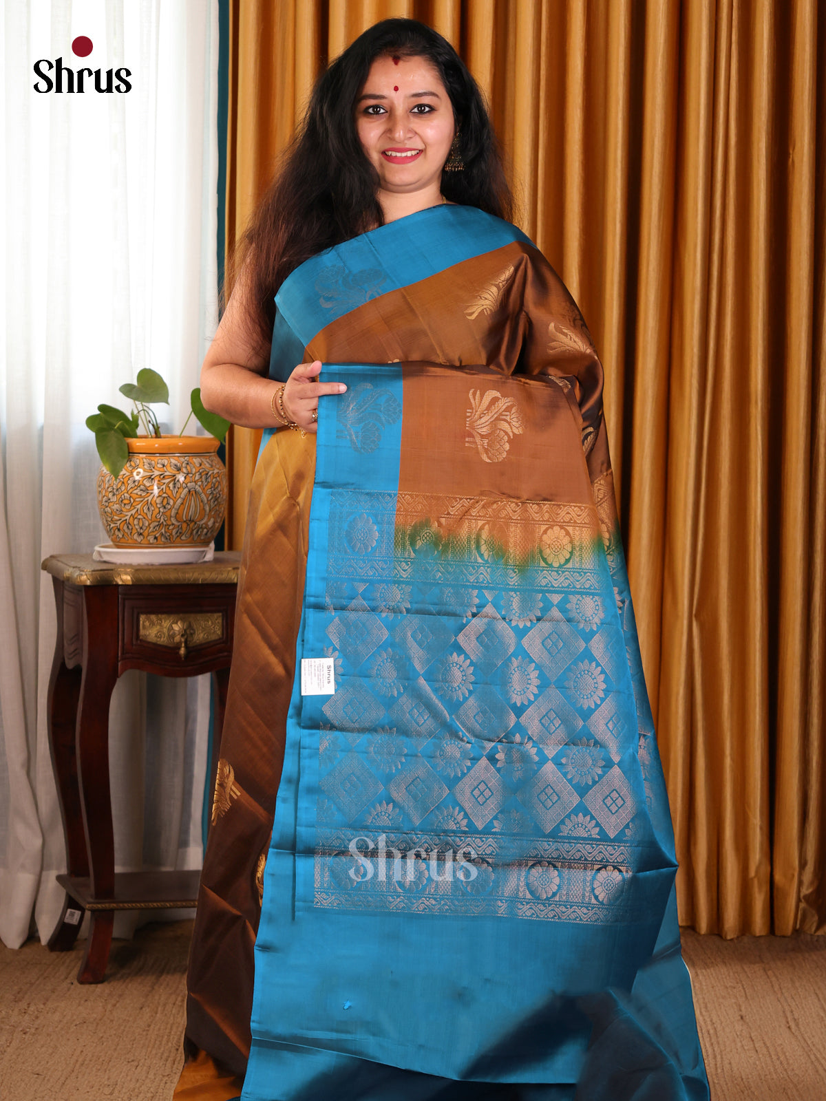 Stunning Brown Softsilk-halfpure Saree with golden motifs & Blue plain Border - Shop on Shrus.com