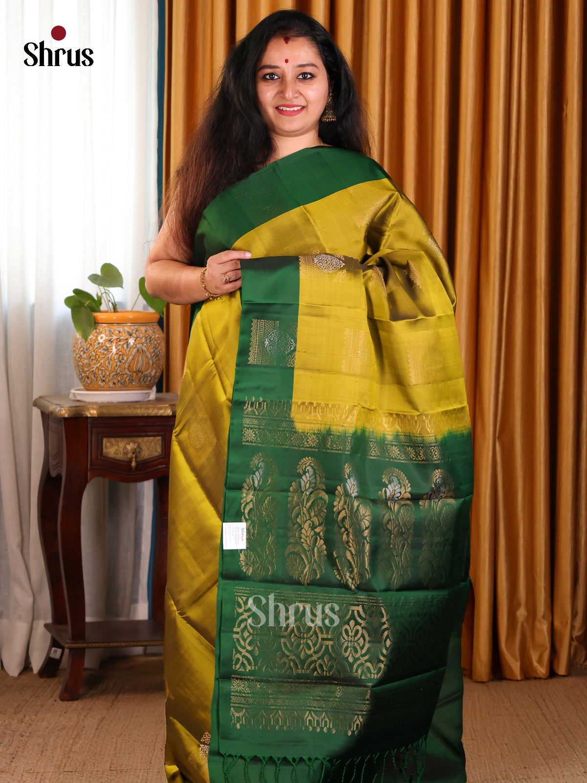 Shimmery Mustardy Green Softsilk-halfpure Saree with gold, silver zari floral motifs - Shop on Shrus.com