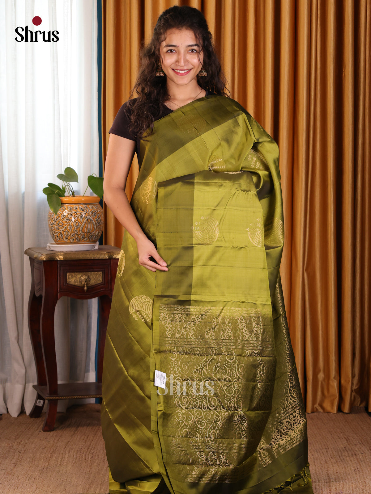 Glimmering Lime Softsilk-halfpure Saree with golden floral motifs & contrast plain border - Shop on Shrus.com
