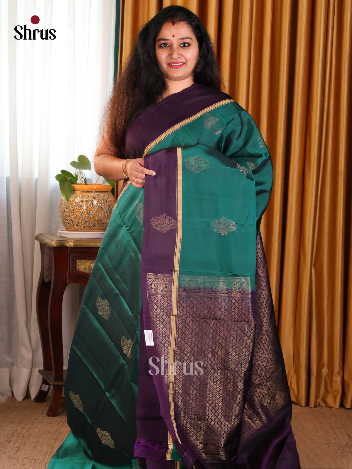 Graceful Green Softsilk-halfpure Saree with gold zari floral motifs & Violet brocade pallu - Shop on Shrus.com