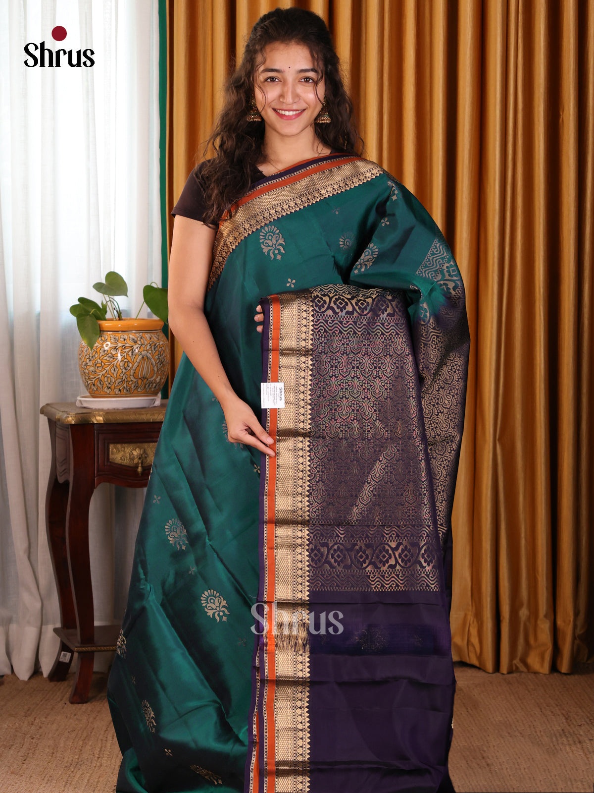 Chic Peacock Green Softsilk-halfpure Saree with golden floral buttas ,blue brocade pallu - Shop on Shrus.com