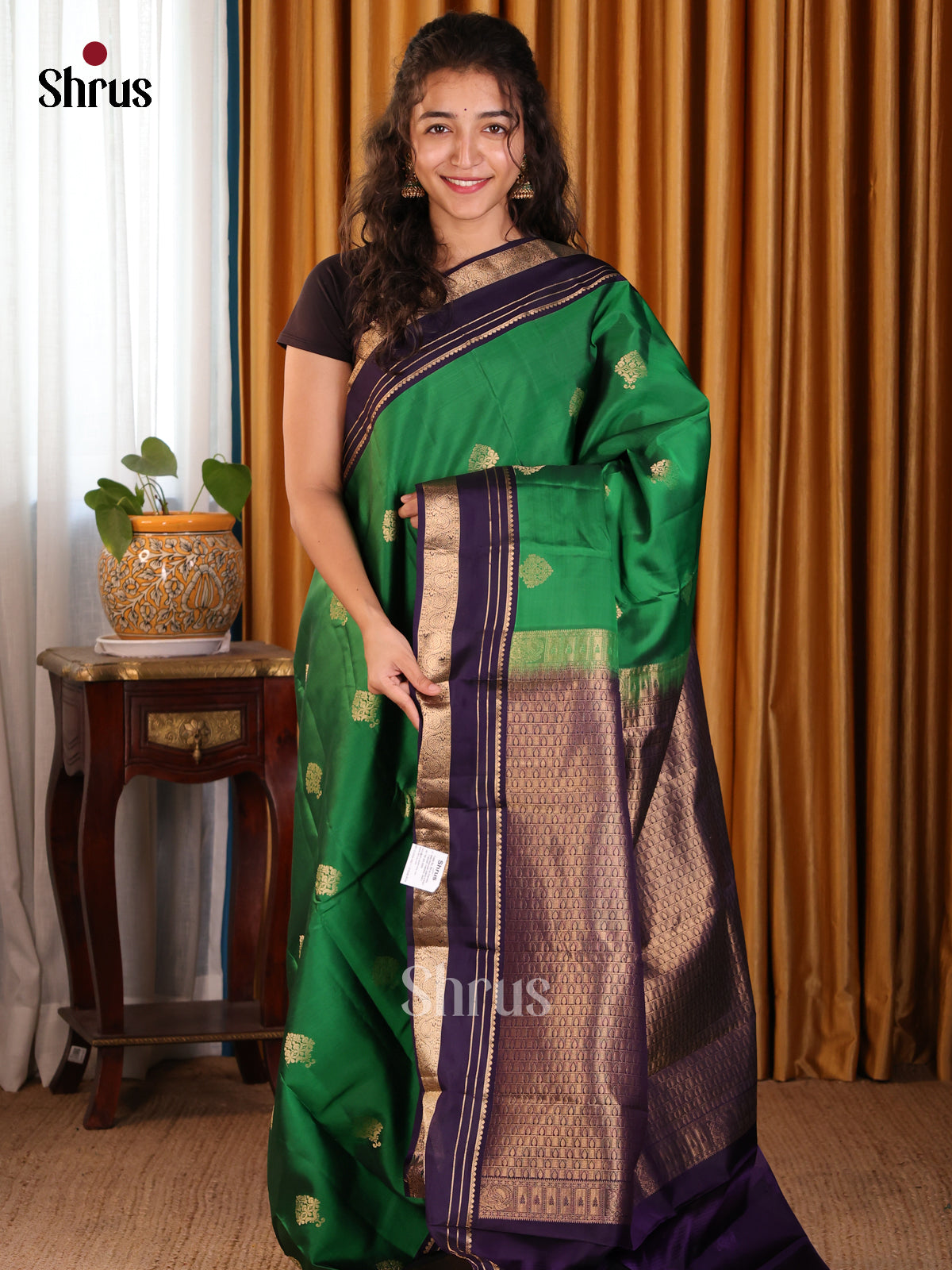 Stunning Green Softsilk-halfpure Saree with golden floral buttas , blue zari border - Shop on Shrus.com