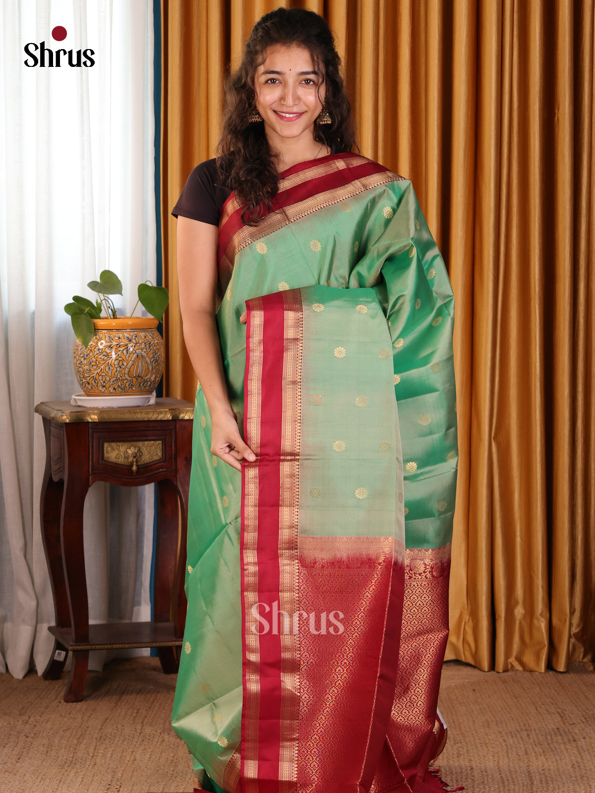 Classy Pastel Green Soft silk Saree with gold zari floral buttas & maroon Rettaipet border - Shop on Shrus.com