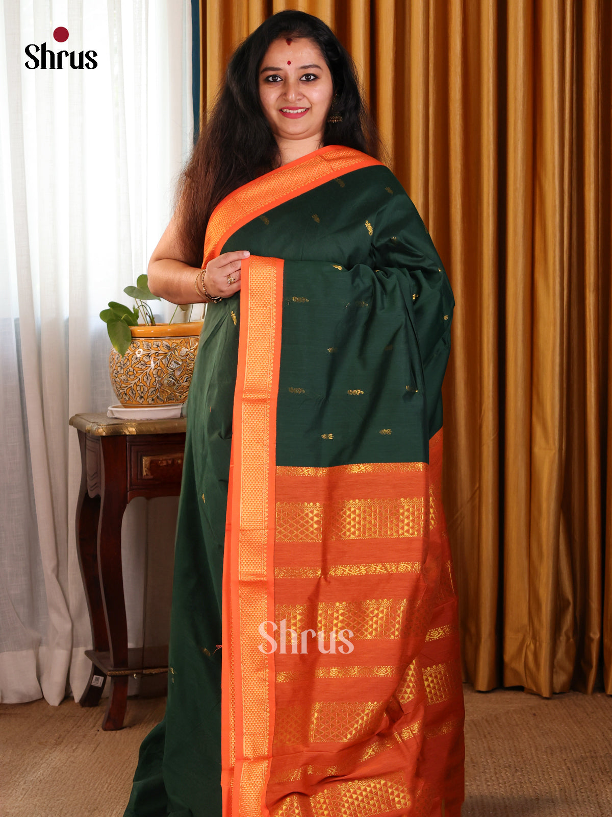 Classy Green Kalyani Cotton Saree with Orange Zari Border & Thread Woven Buttas Pallu - Shop on Shrus.com