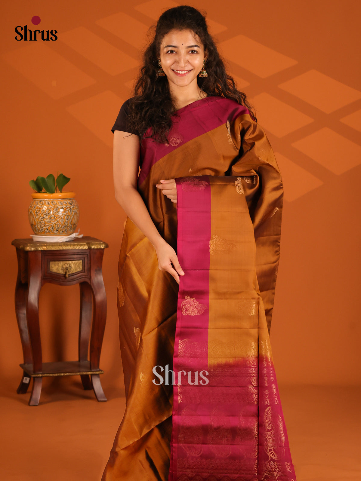A Lustrous Dark Mustard with Maroon Softsilk-halfpure Saree shines with zari floral buttas - Shop on Shrus.com