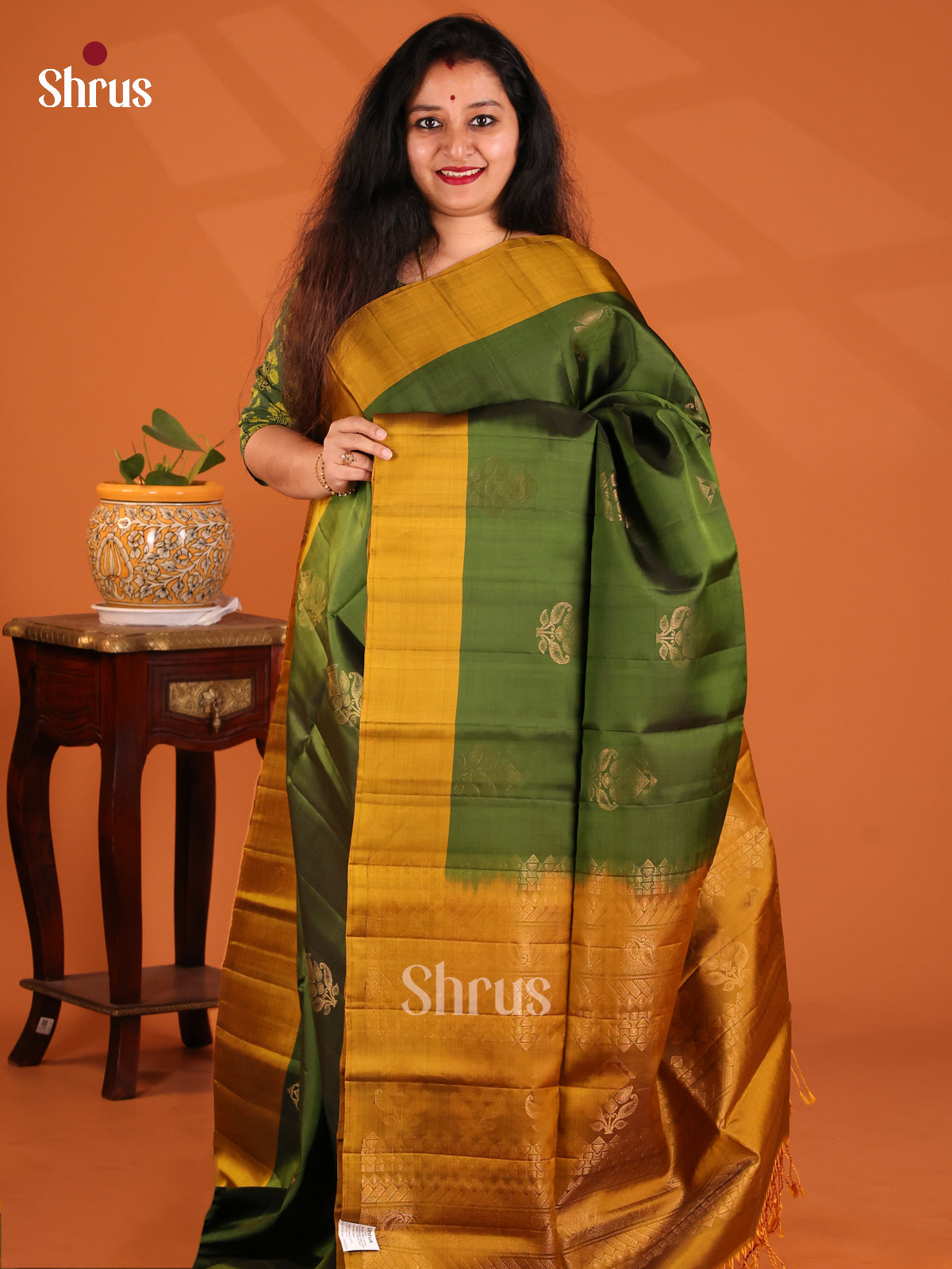 Gorgeous Green Softsilk-halfpure Saree with golden floral buttas , mustard brocade Pallu - Shop on Shrus.com