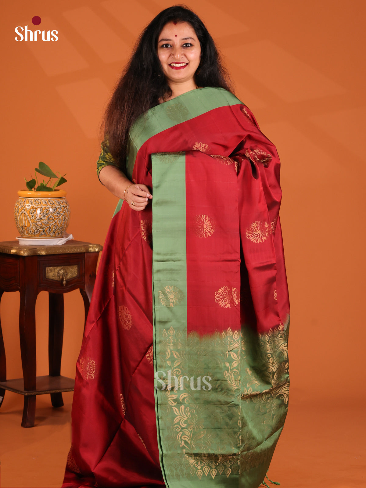 Glimmering Red Softsilk-halfpure Saree with gold zari floral motifs , brocade pallu