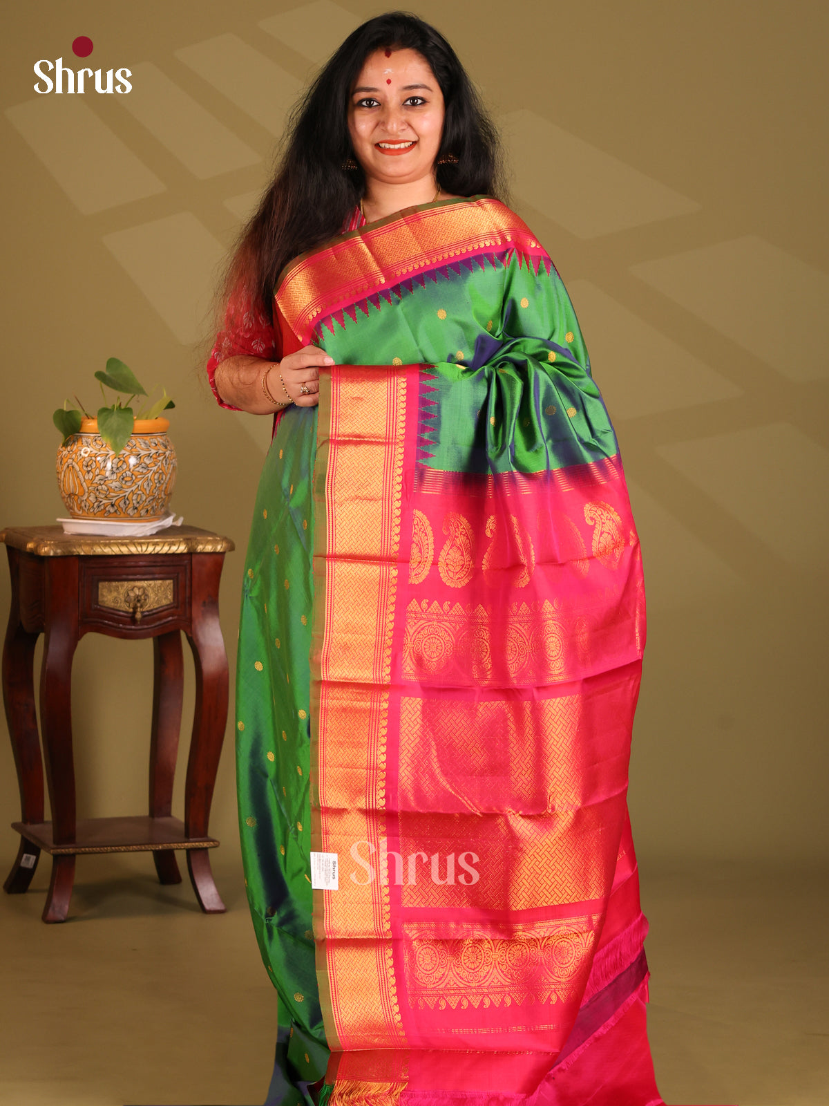 Classic Green Gadwal silk Saree with gold zari buttas & pink zari border