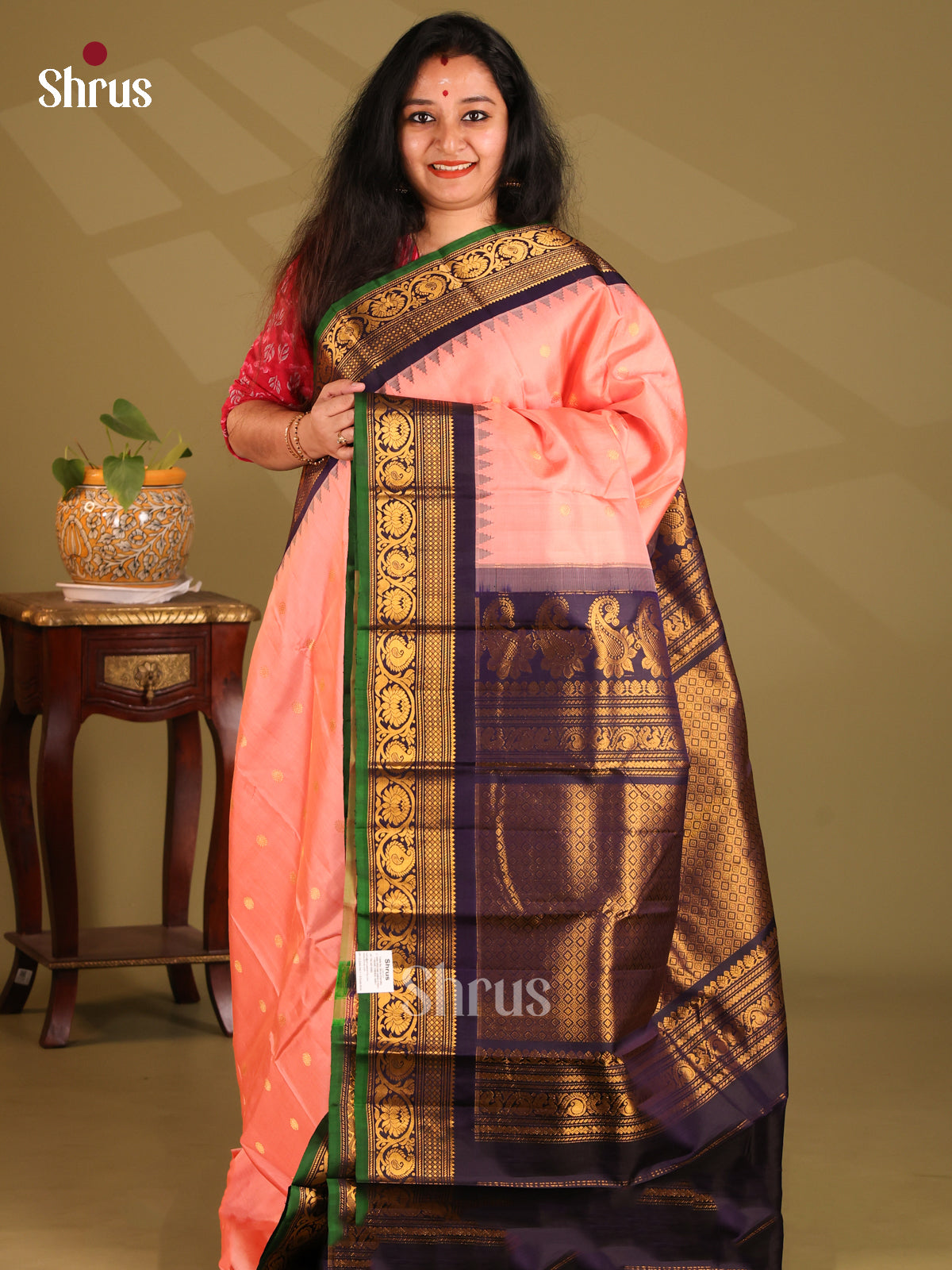 Exquisite Peachish pink Gadwal silk Saree with zari buttas & brocade pallu