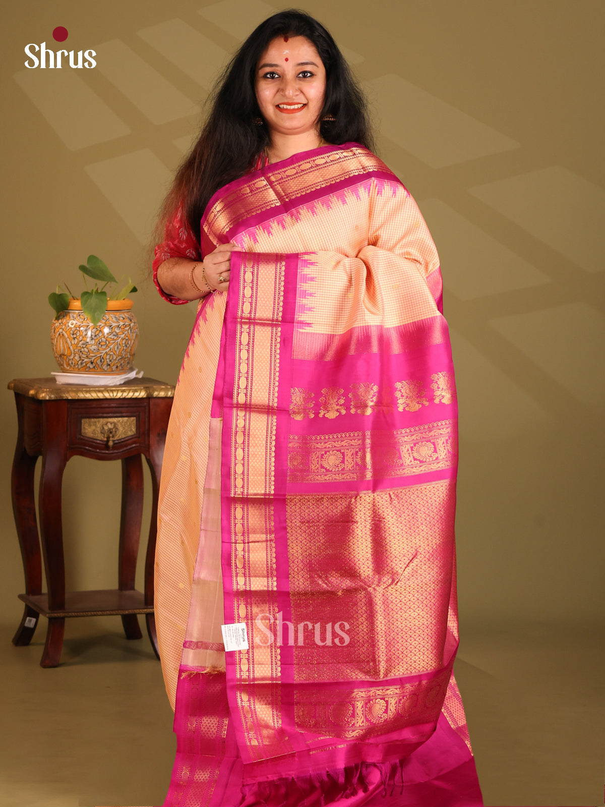 Vibrant Peach Gadwal silk Saree with zati buttas , checks pattern , contrast brocade pallu - Shop on Shrus.com