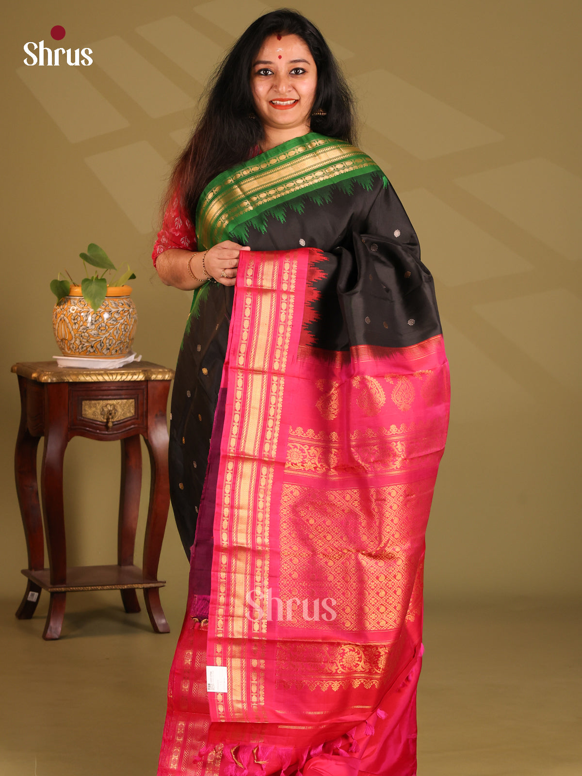 Mystique Black Gadwal silk Saree with zari buttas & contrast Ganga Jamuna border