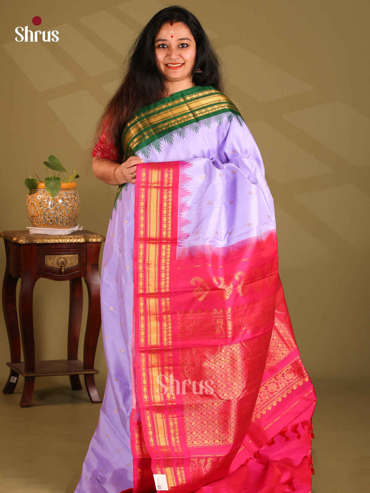 Enchanting Lavender Gadwal silk Saree with gold zari buttas & Ganga Jamuna Border