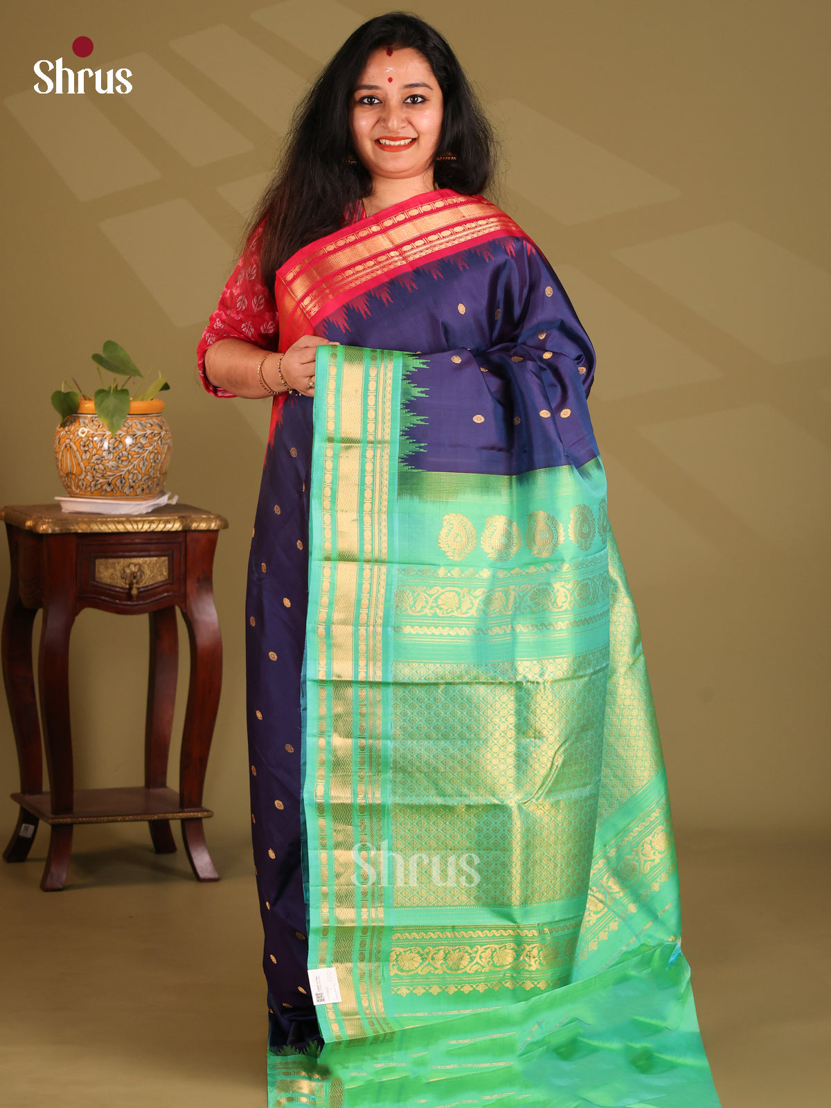 Vibrant Blue Gadwal silk Saree with gold zari buttas & green brocade pallu