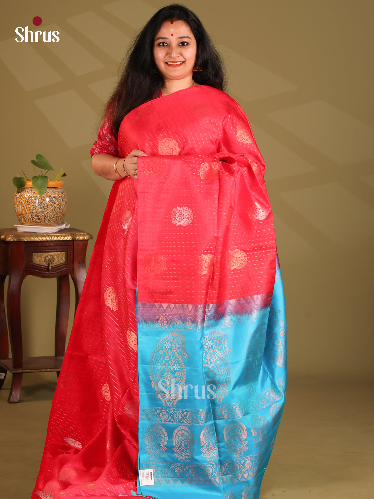 Bright Red borderless Soft Silk Saree with zari stripes,buttas , Blue paisley motif pallu-1