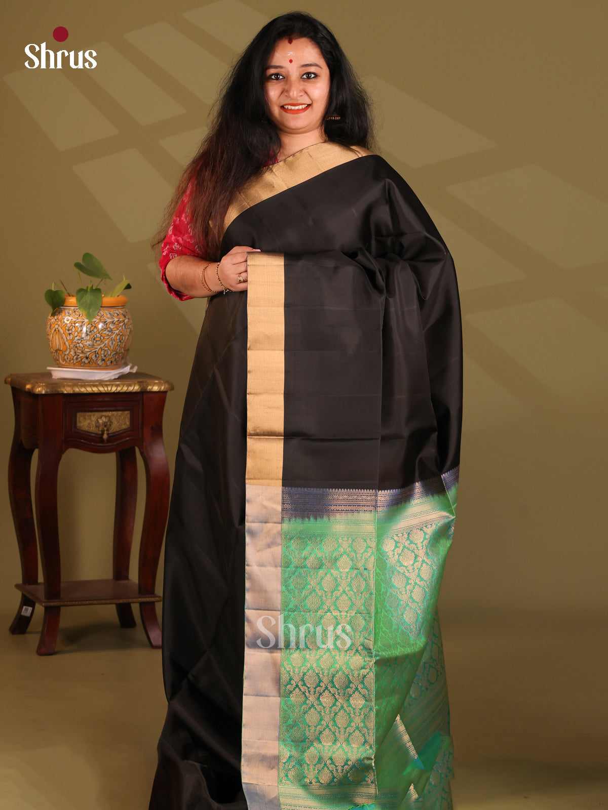 Elegant Black Soft Silk Saree with plain body ,Green zari brocade pallu-1