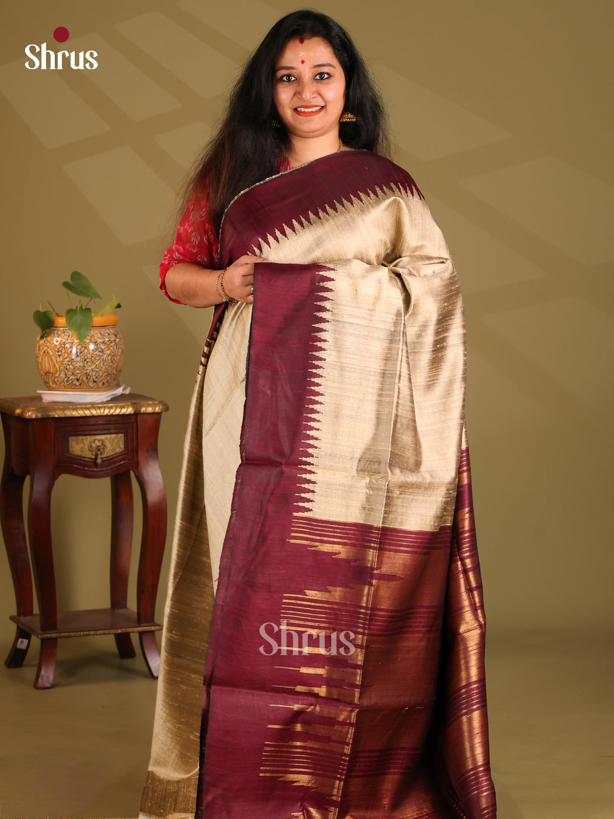 Graceful Cream Raw Silk Saree with plain body , contrast maroon temple border - Shop on Shrus.com