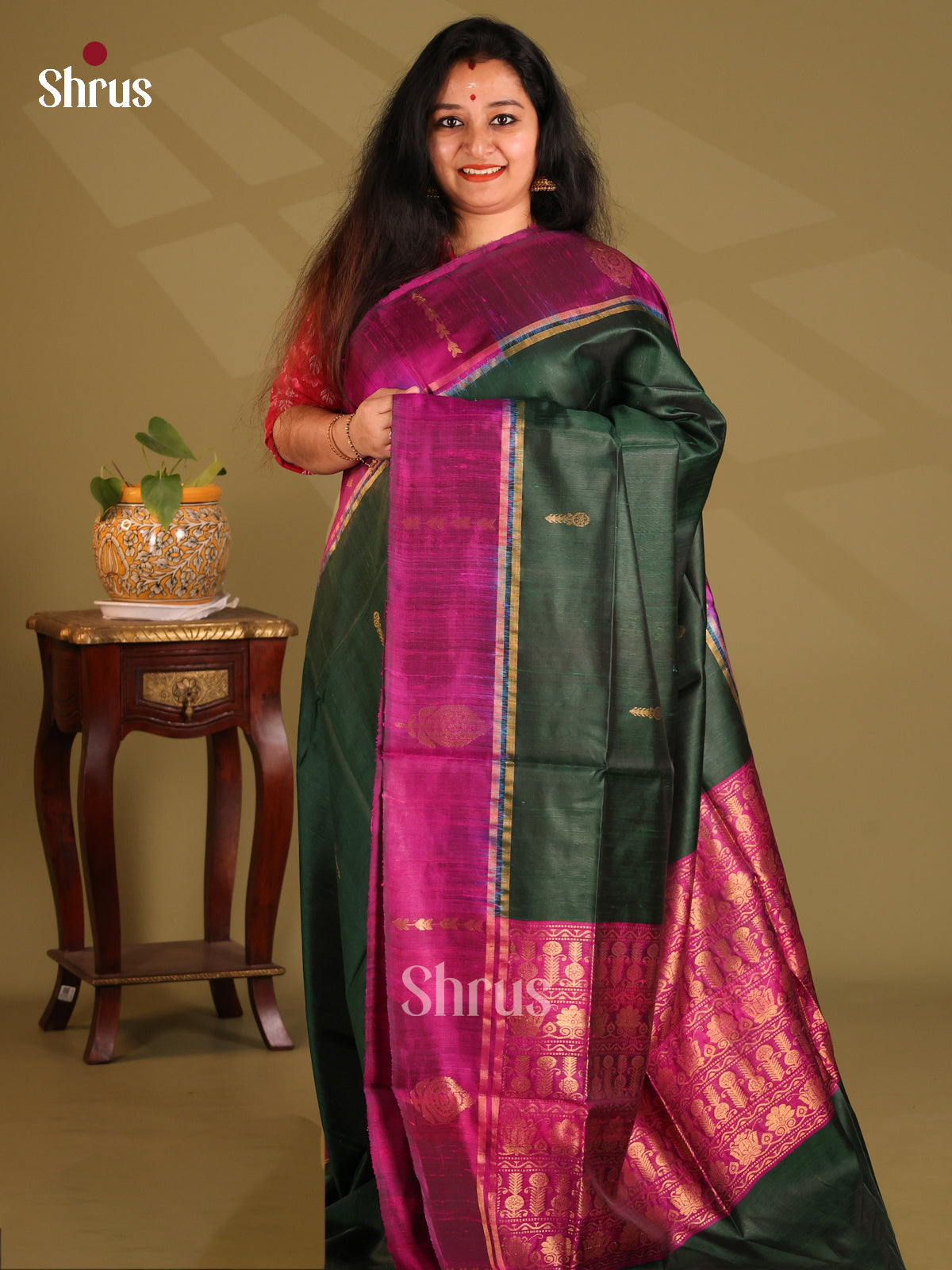Classy Dark Bottle Green Raw Silk Saree with zari buttas , floral brocade pallu - Shop on Shrus.com