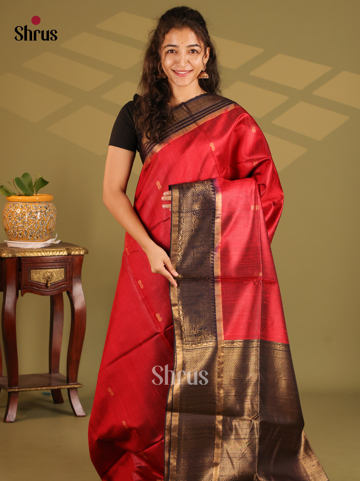 Dazzling Red Raw Silk Saree with gold zari floral buttas , black zari woven pallu