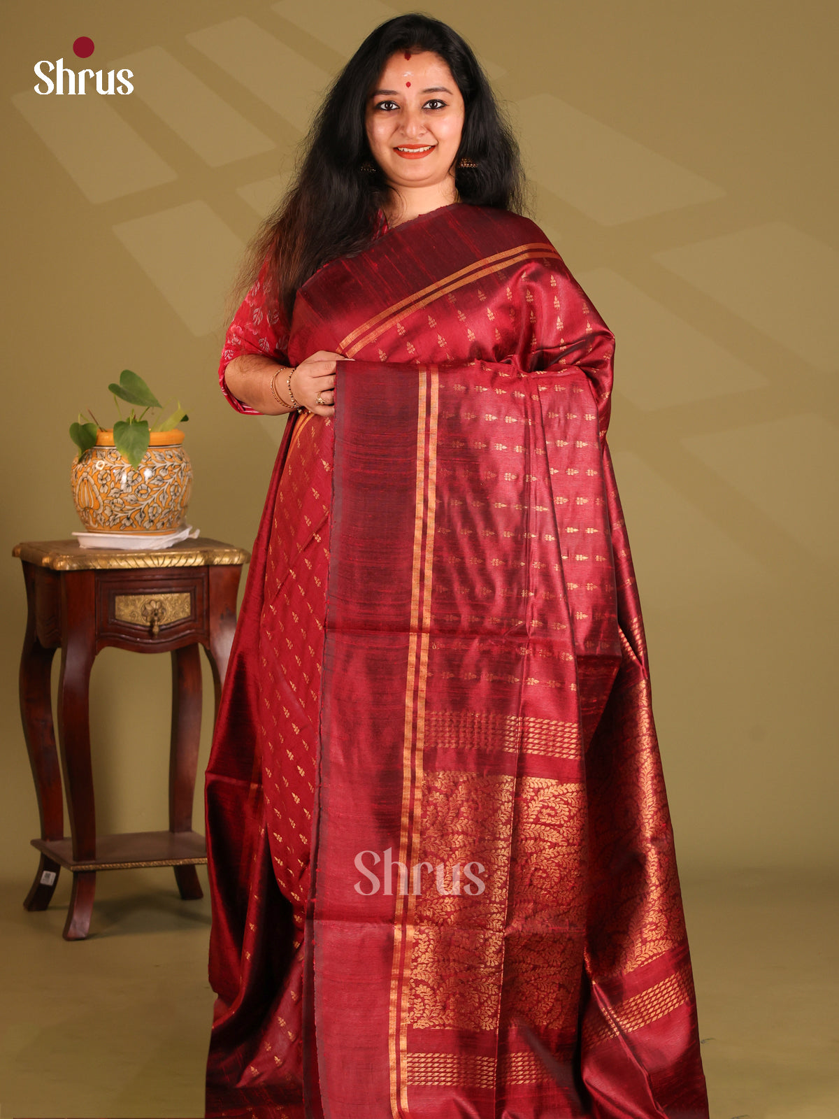 Regal Maroon single Tone Raw Silk Saree gleams with gold zari buttas , floral brocade pallu - Shop on Shrus.com