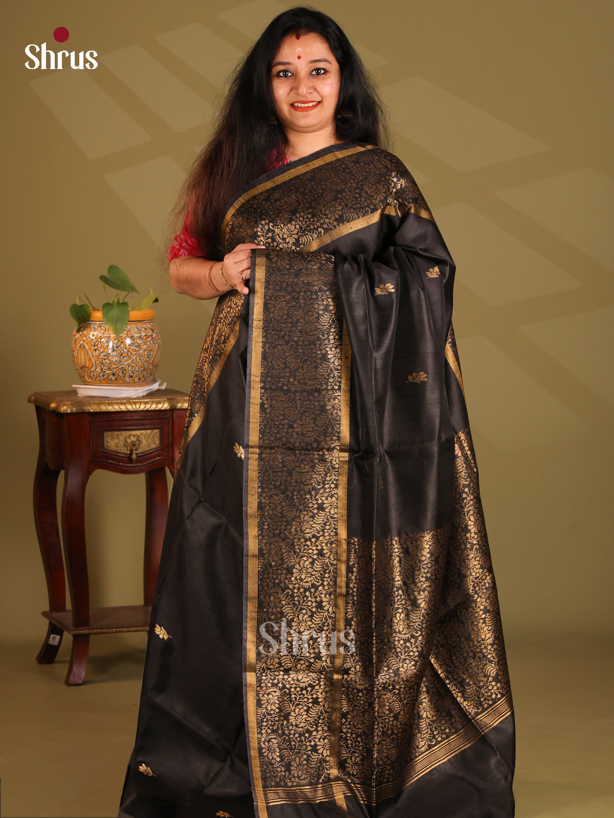 Beautiful Black Raw Silk Saree gleam with gold zari floral butta,self floral brocade border - Shop on Shrus.com