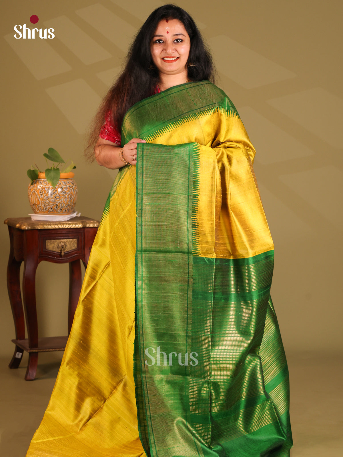 Glorious Yellow Raw Silk Saree with contrast Green zari border, pallu - Shop on Shrus.com