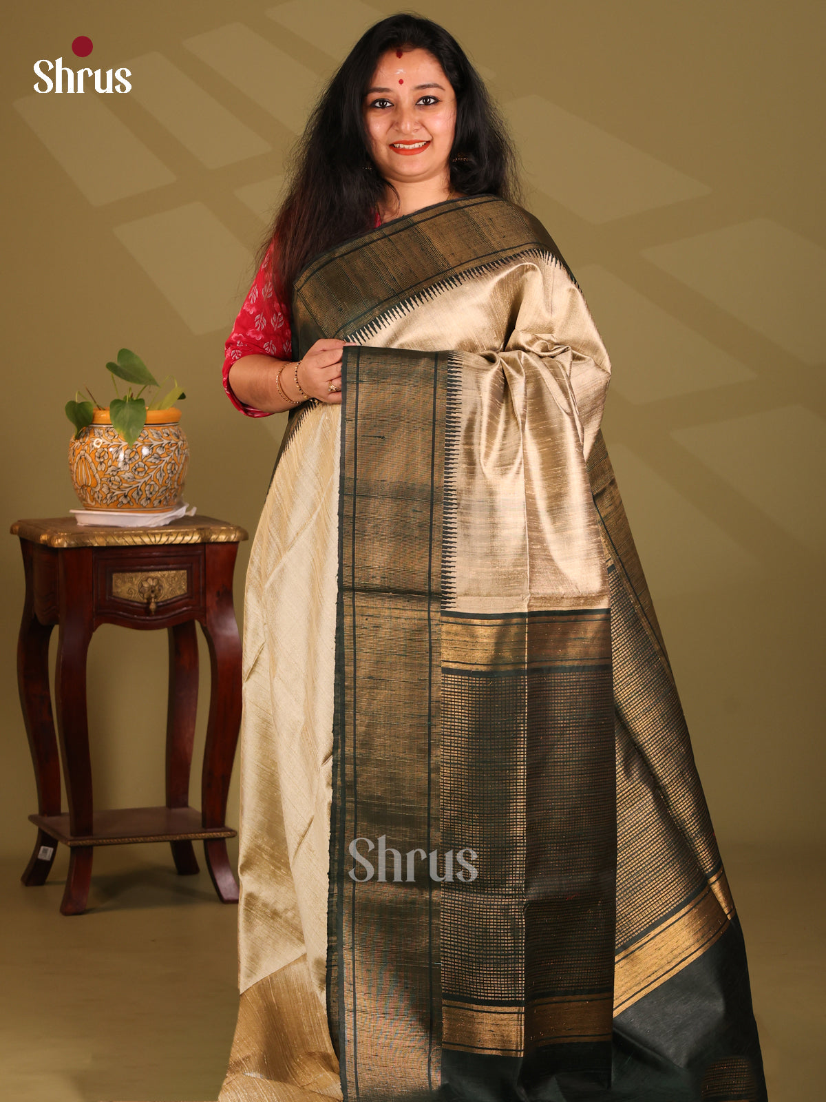 Charming Cream Raw Silk Saree with contrast Green zari woven border - Shop on Shrus.com