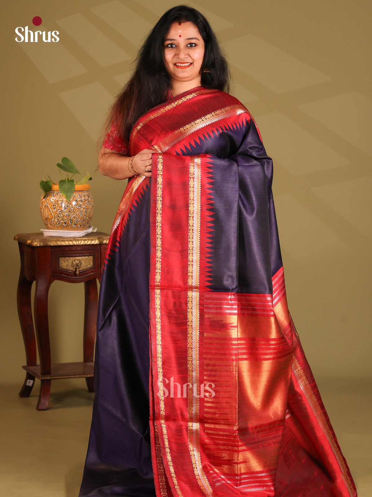 Vibrant Blue Raw Silk Saree with Maroon zari woven pallu