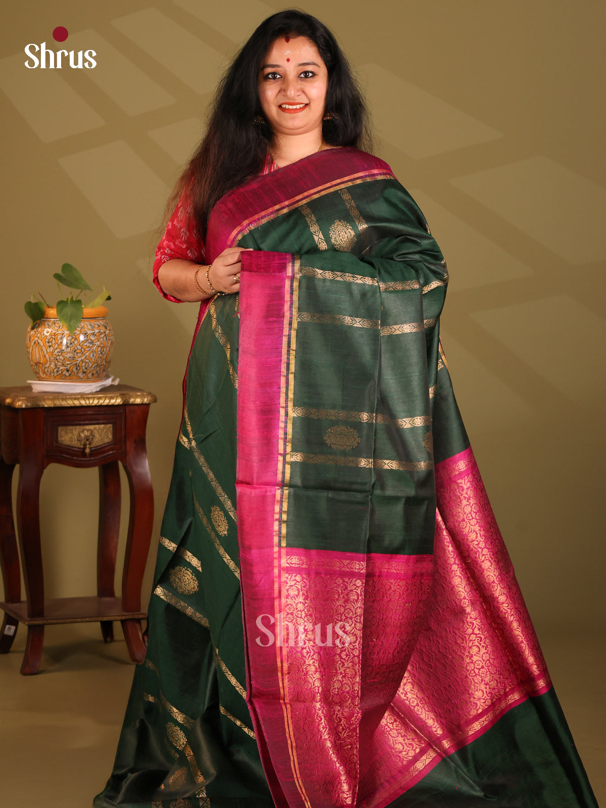 Dark Green Raw Silk Saree with zari stripes , motifs , maroon contrast Border