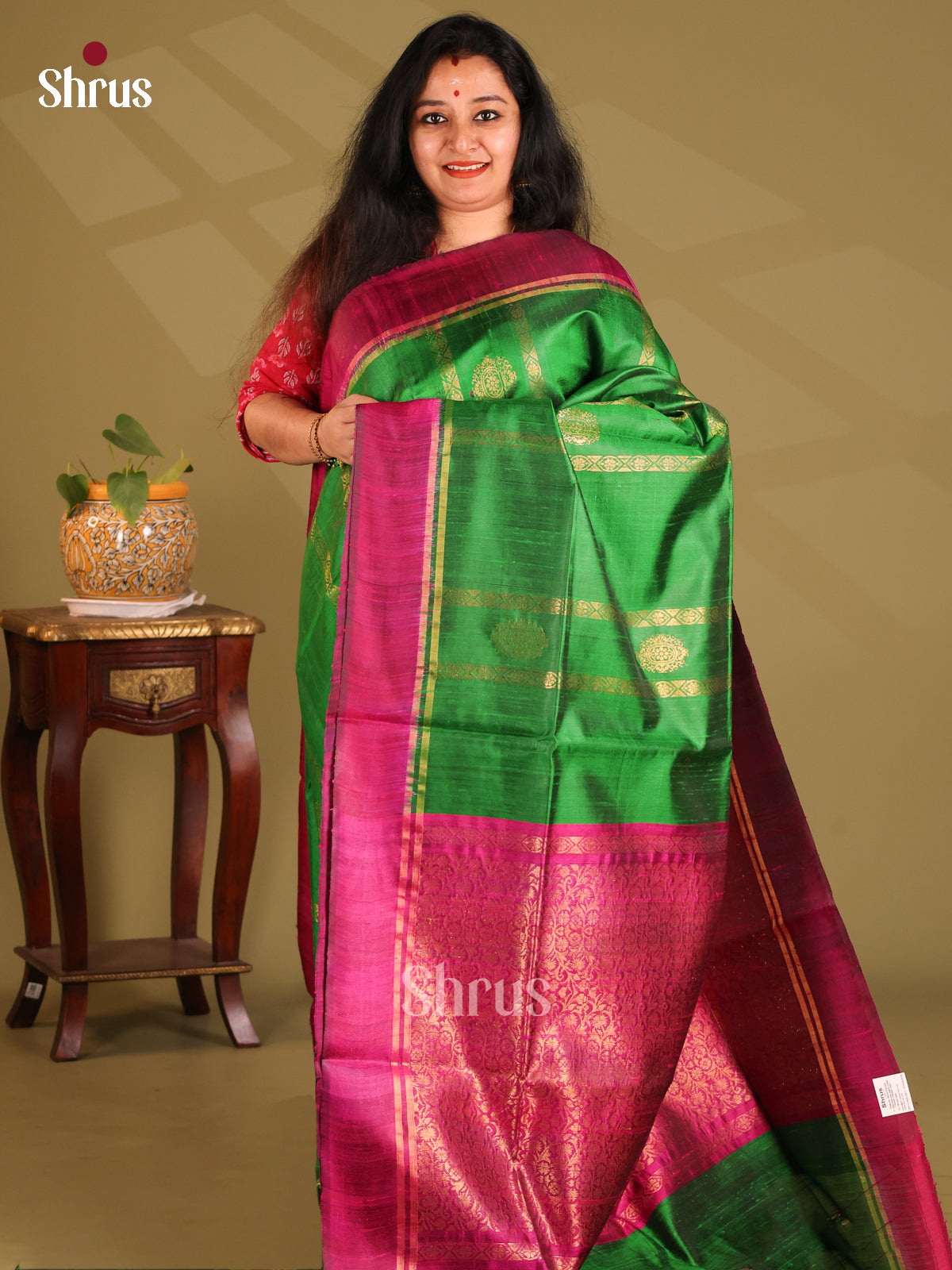 Beautiful Green Raw Silk Saree with gold zari stripes, motifs , purple brocade pallu