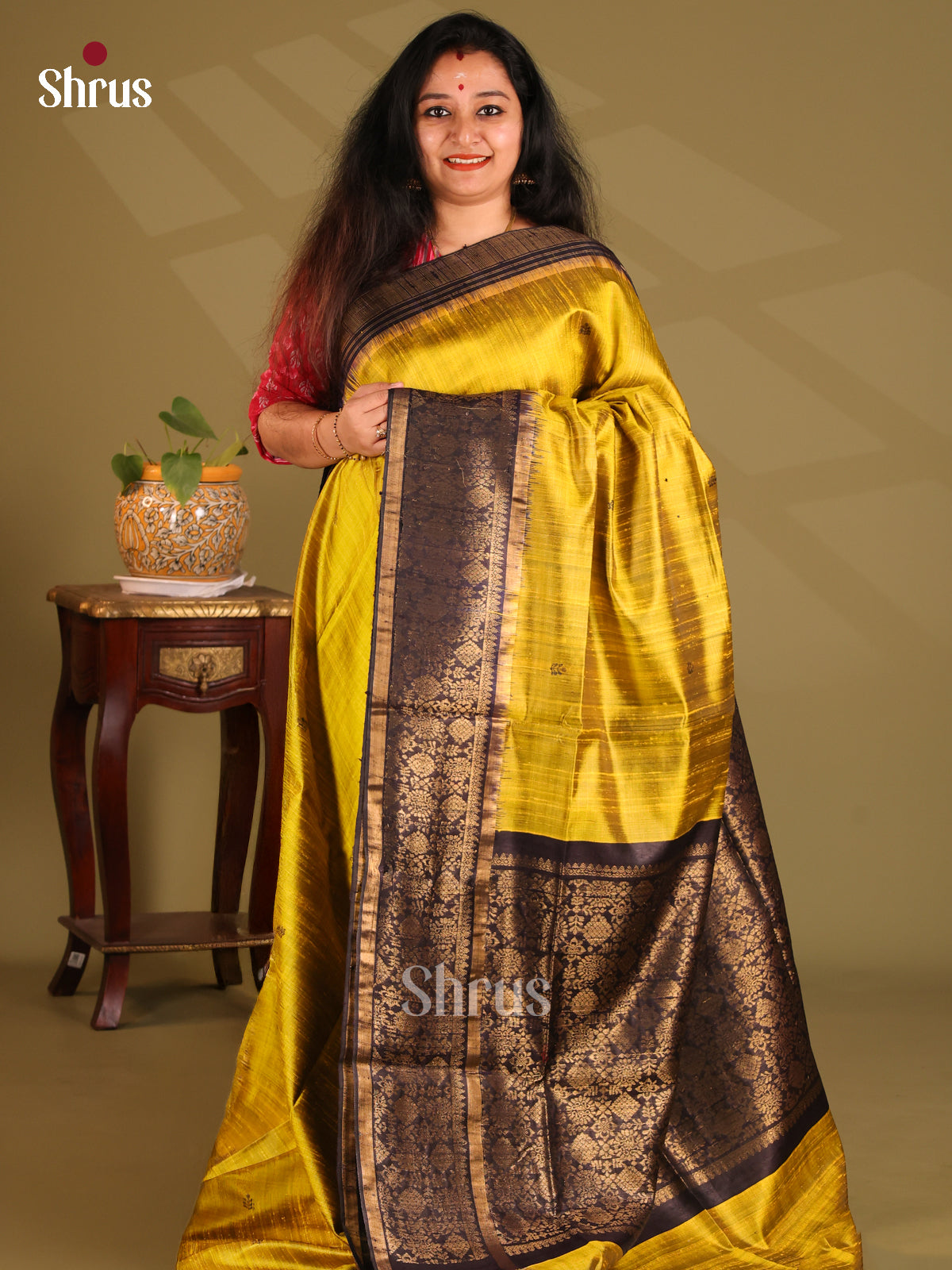 Glimmering Mustard Raw Silk Saree with gold zari buttas , black zari floral brocade pallu - Shop on Shrus.com