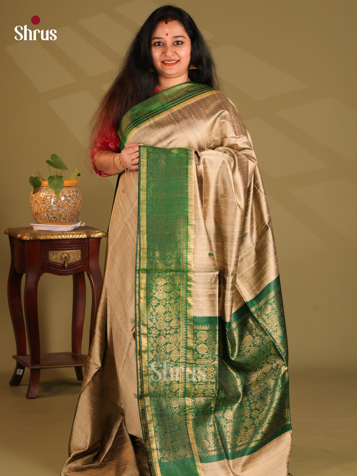 Dazzling Gold Raw Silk Saree with zari woven buttas, contrast green floral brocade pallu - Shop on Shrus.com