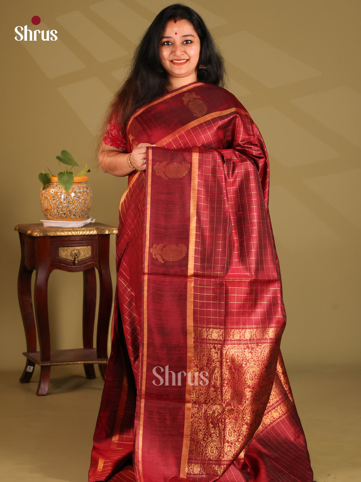 Ethereal Maroon single tone Raw Silk Saree with gold zari checks , floral brocade pallu - Shop on Shrus.com