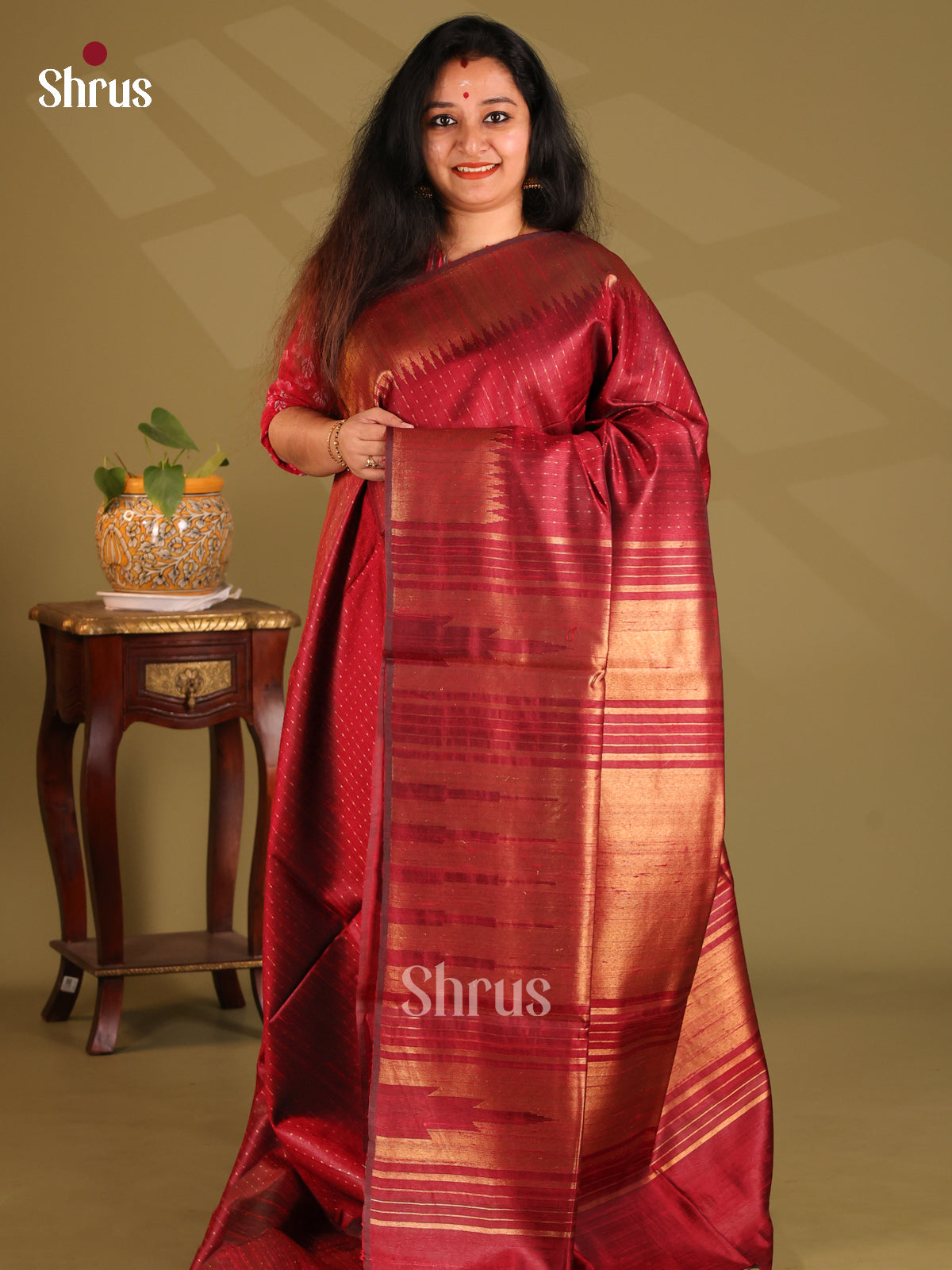 Exquisite Maroon Single tone Raw Silk Saree with zari striped body, self border - Shop on Shrus.com