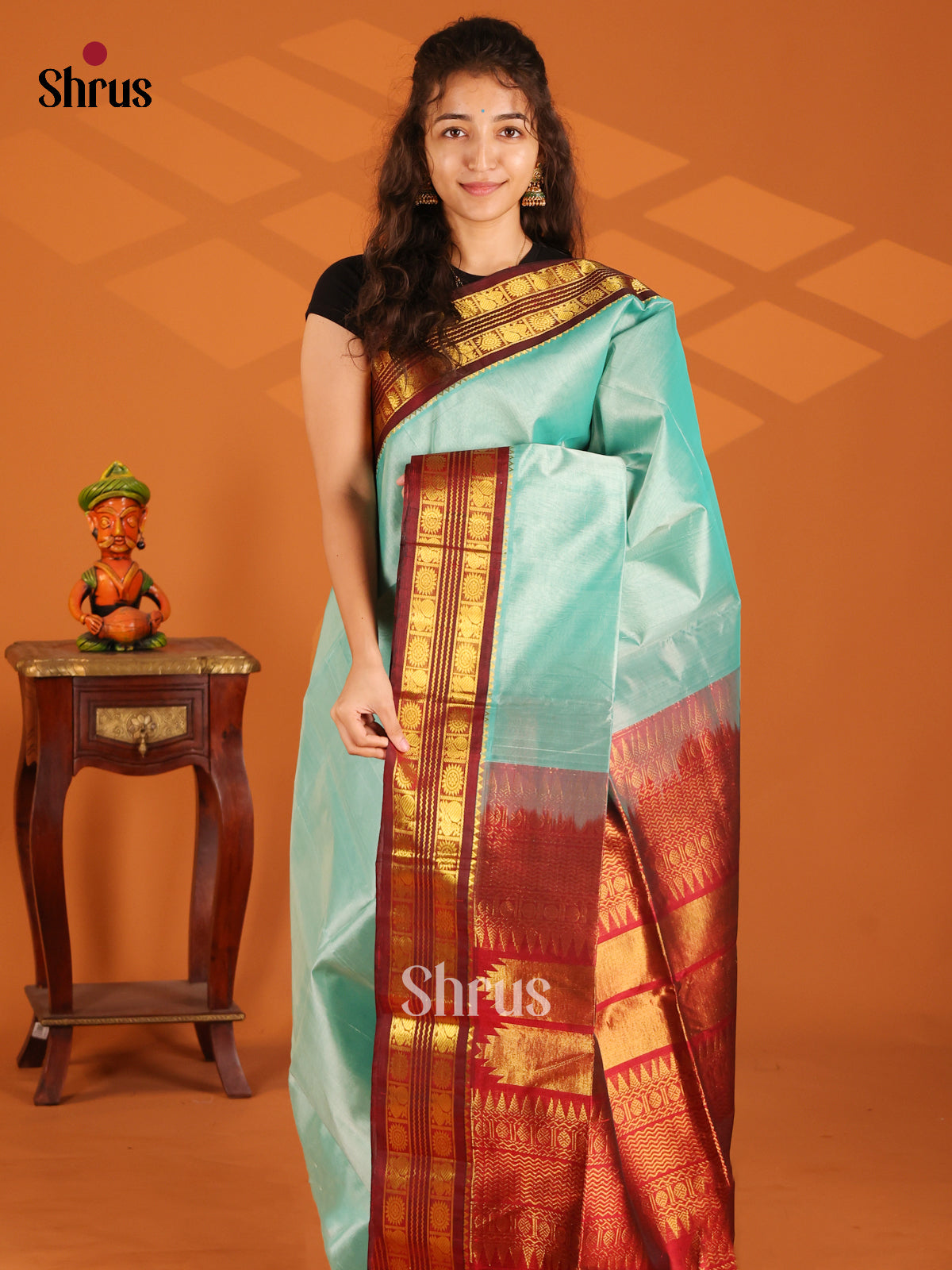 Charming Ice Blue Silk Cotton Saree with gold zari floral buttas border - Shop on Shrus.com