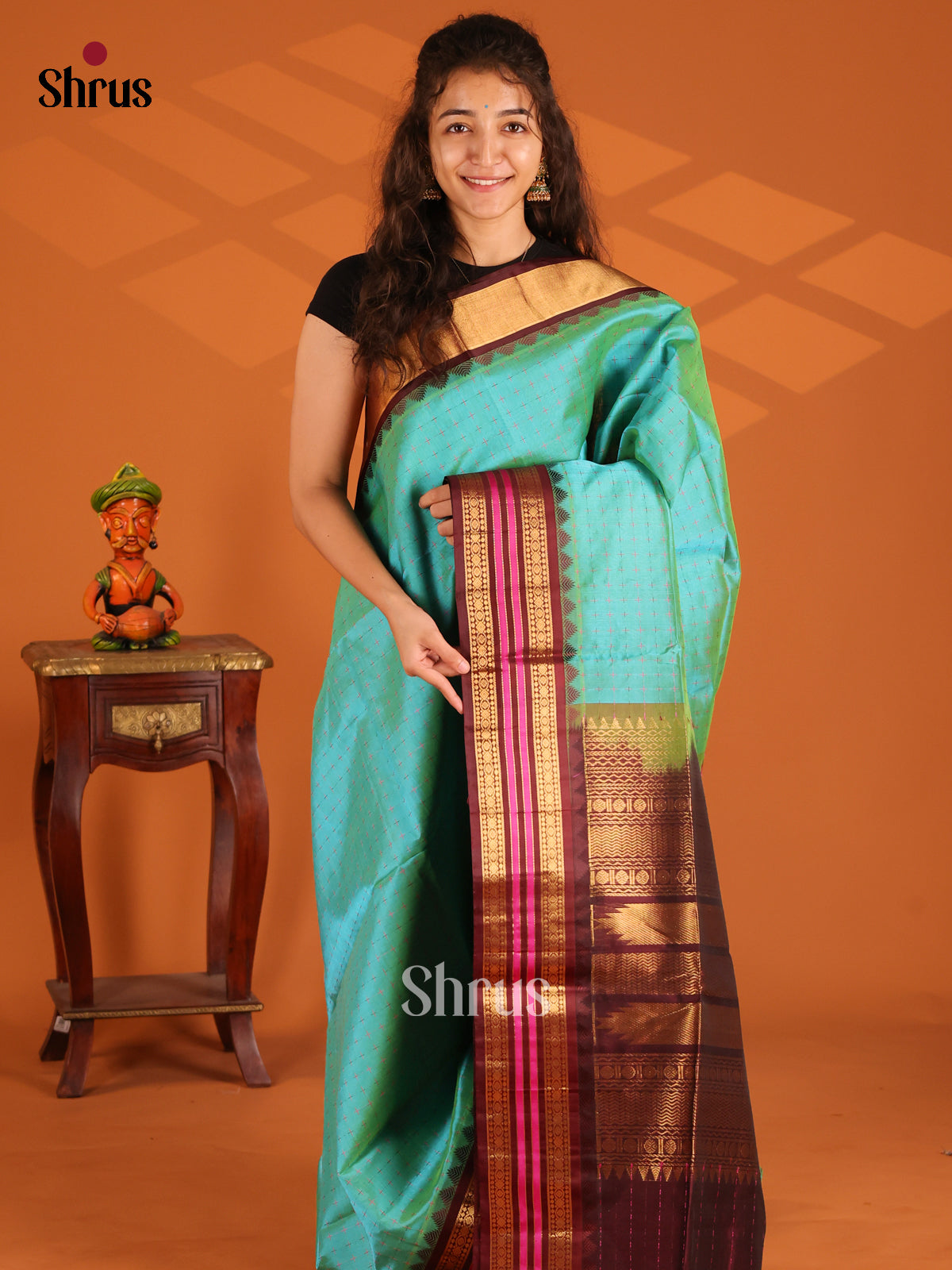 Serene Teal Silk Cotton Saree with checks & brown zari border