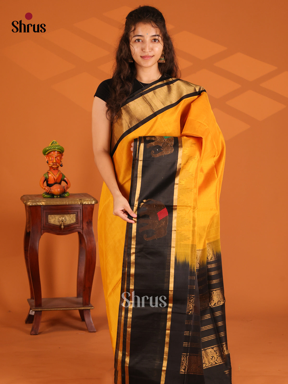 Luminous Mustard Silk Cotton Saree with gold zari elephant motifs in black border - Shop on Shrus.com