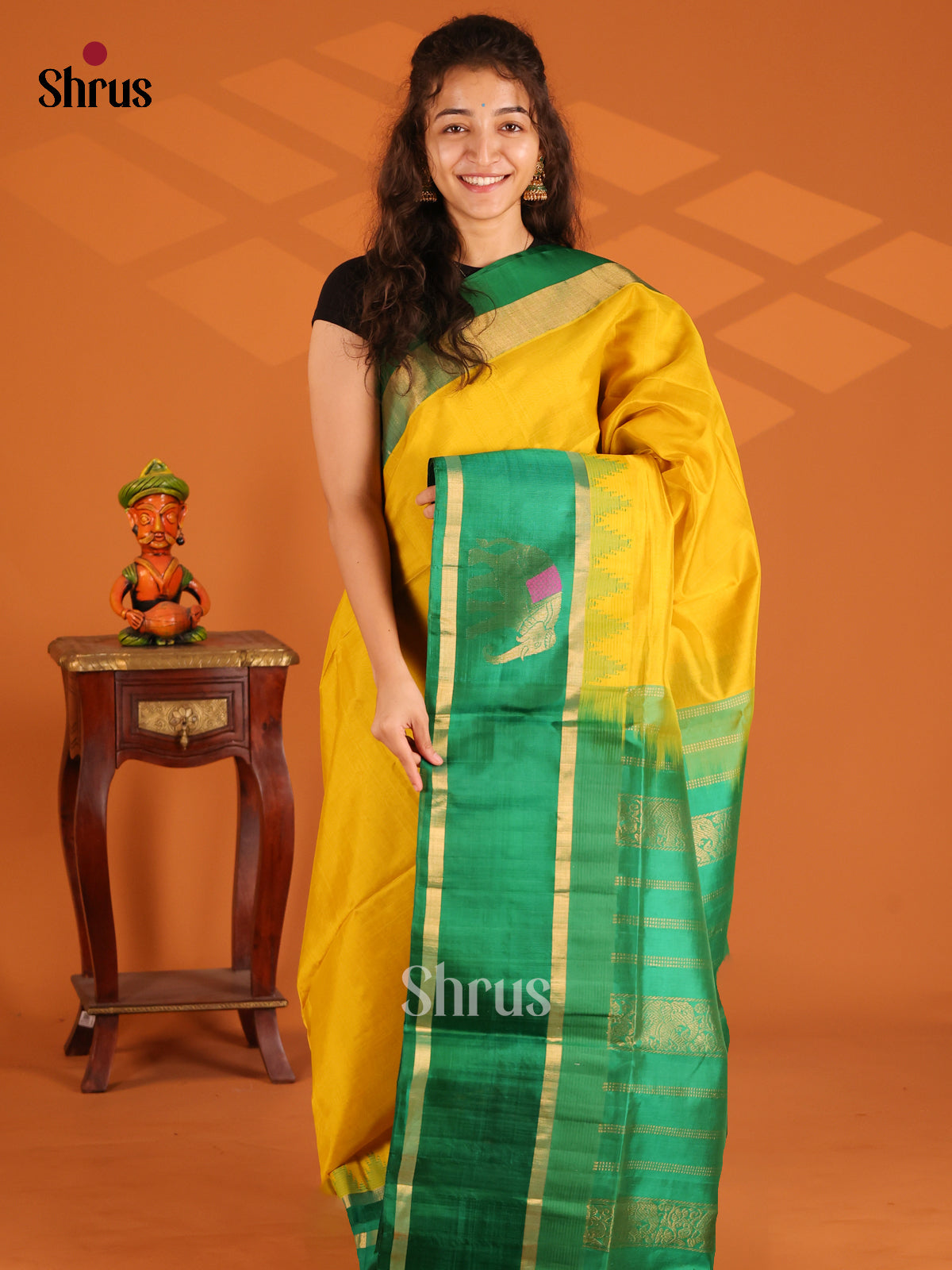 Bright Yellow Silk Cotton Saree with zari elephant motifs in green border - Shop on Shrus.com