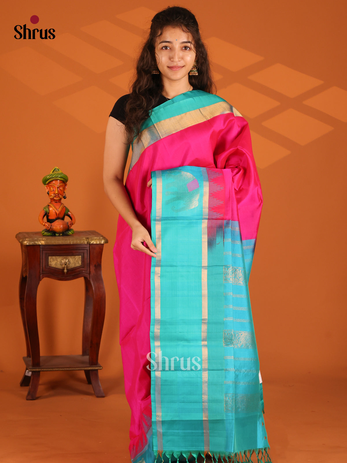 Deep Pink korvai Silk Cotton Saree with zari elephant motifs & teal border