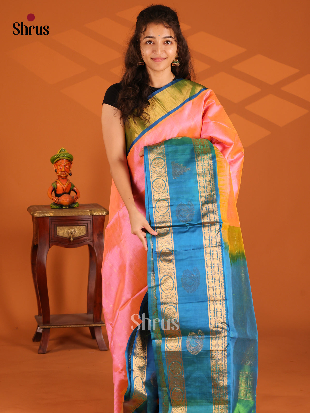 Beautiful Peach Silk Cotton Saree with zari buttas & rettaipet border