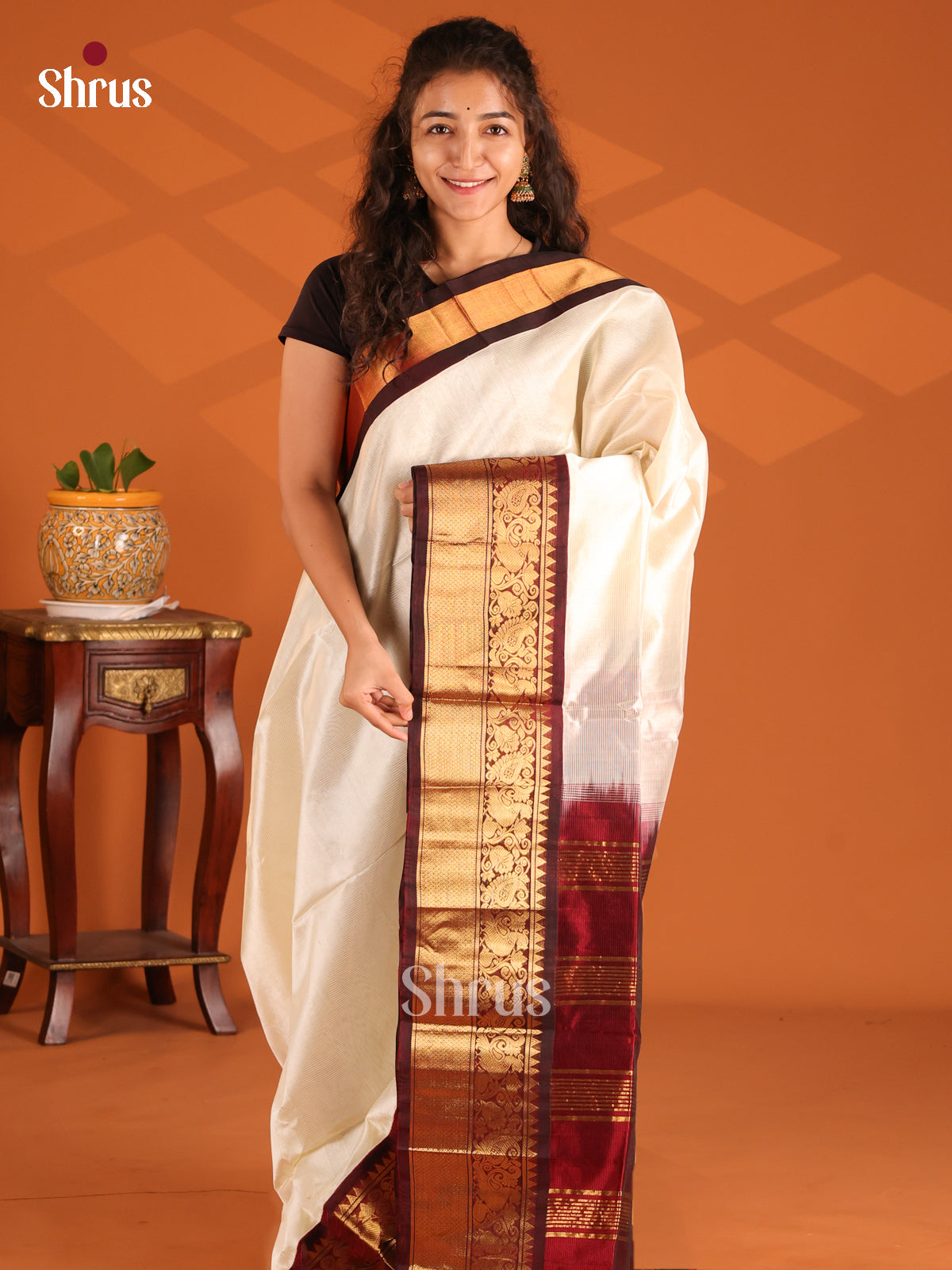 Cream & Brown Silk Cotton Saree with gold zari peacock vines border - Shop on Shrus.com