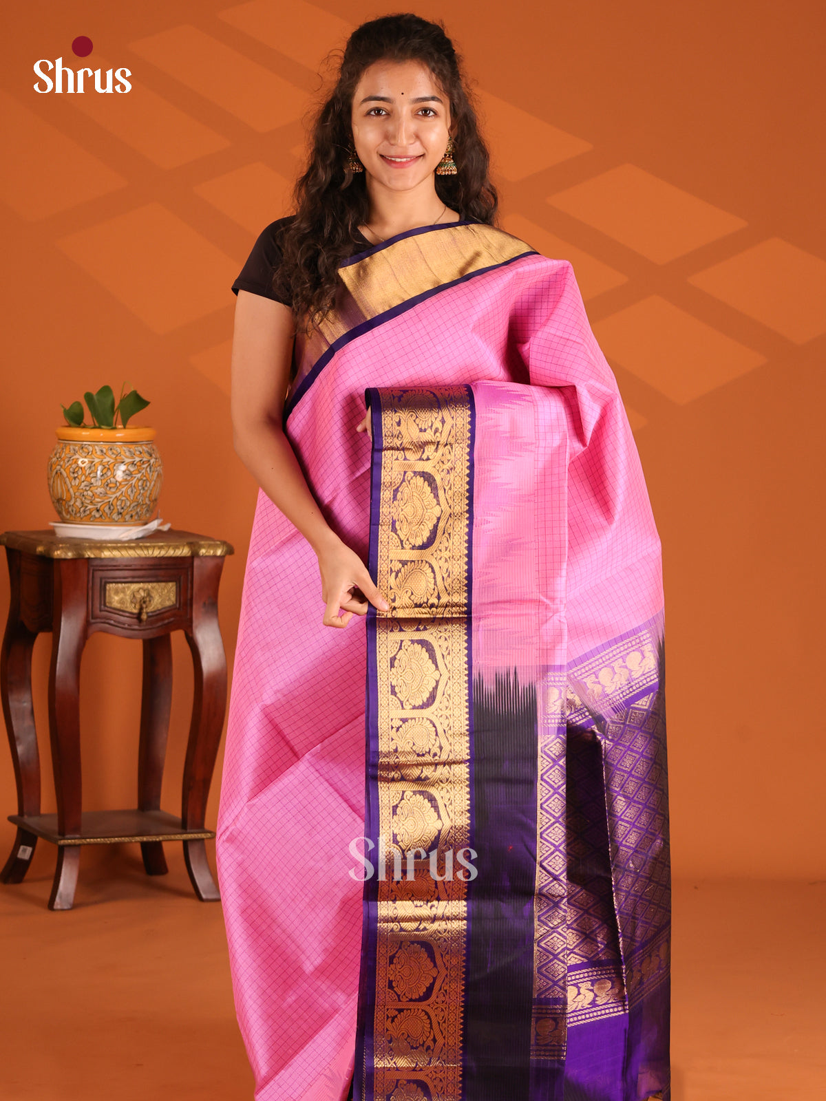 Charming Pink Silk Cotton Saree with splendid peacock motifs zari border