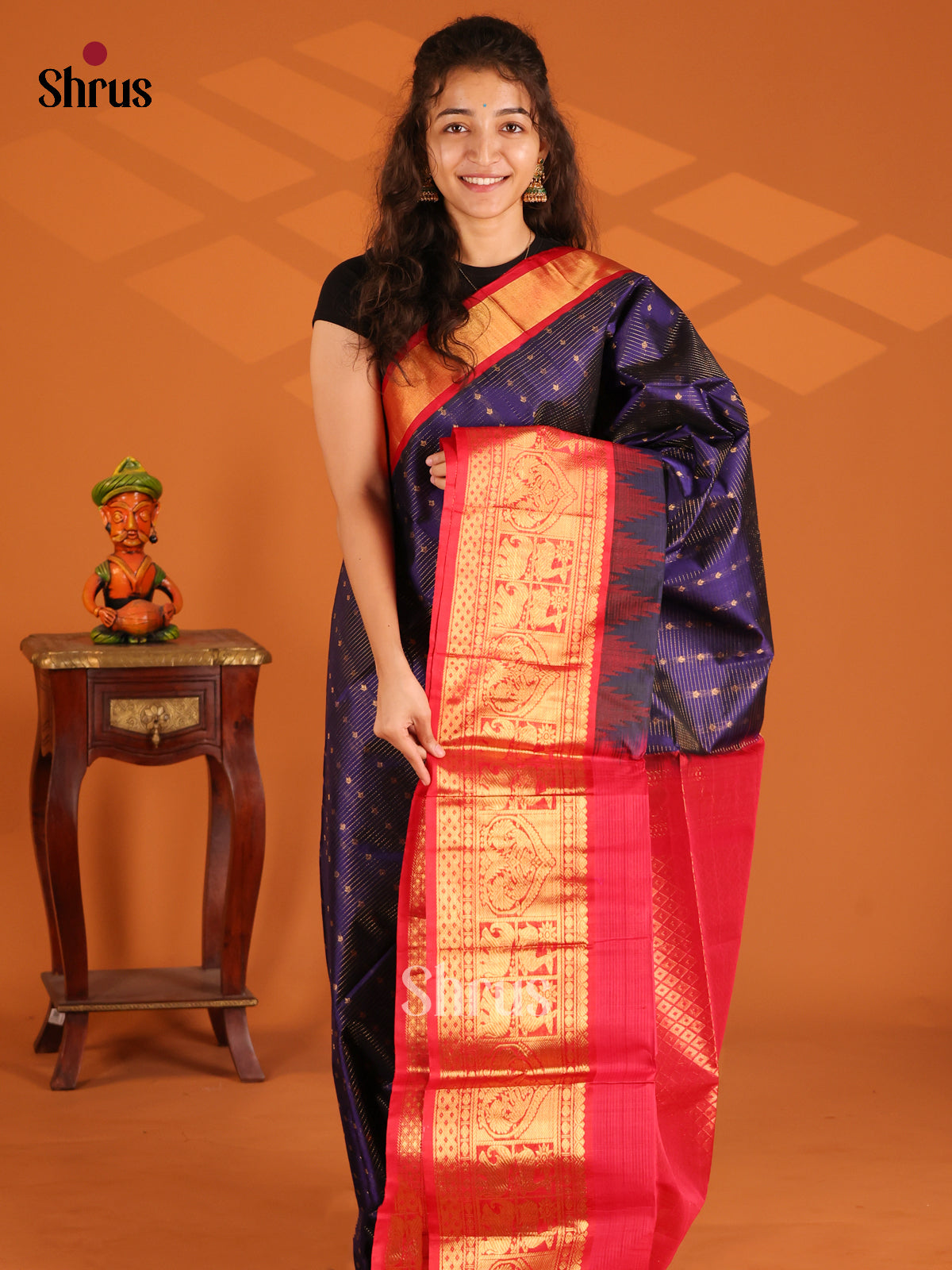 Exquisite Violet Silk Cotton Saree with Zari deer & elephant buttas in Red border