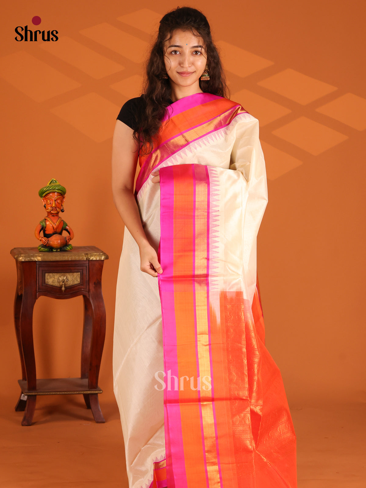 Lustrous Cream Silk Cotton Saree with Orange zari woven floral brocade pallu - Shop on Shrus.com