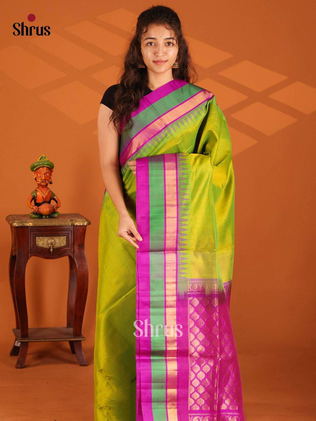 Ethereal Parrot Green Silk Cotton Saree wih zari brocade purple pallu - Shop on Shrus.com