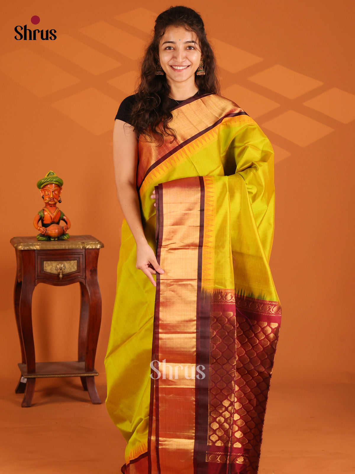 Serene Mustardy Green Silk Cotton Saree with brown brocade pallu - Shop on Shrus.com