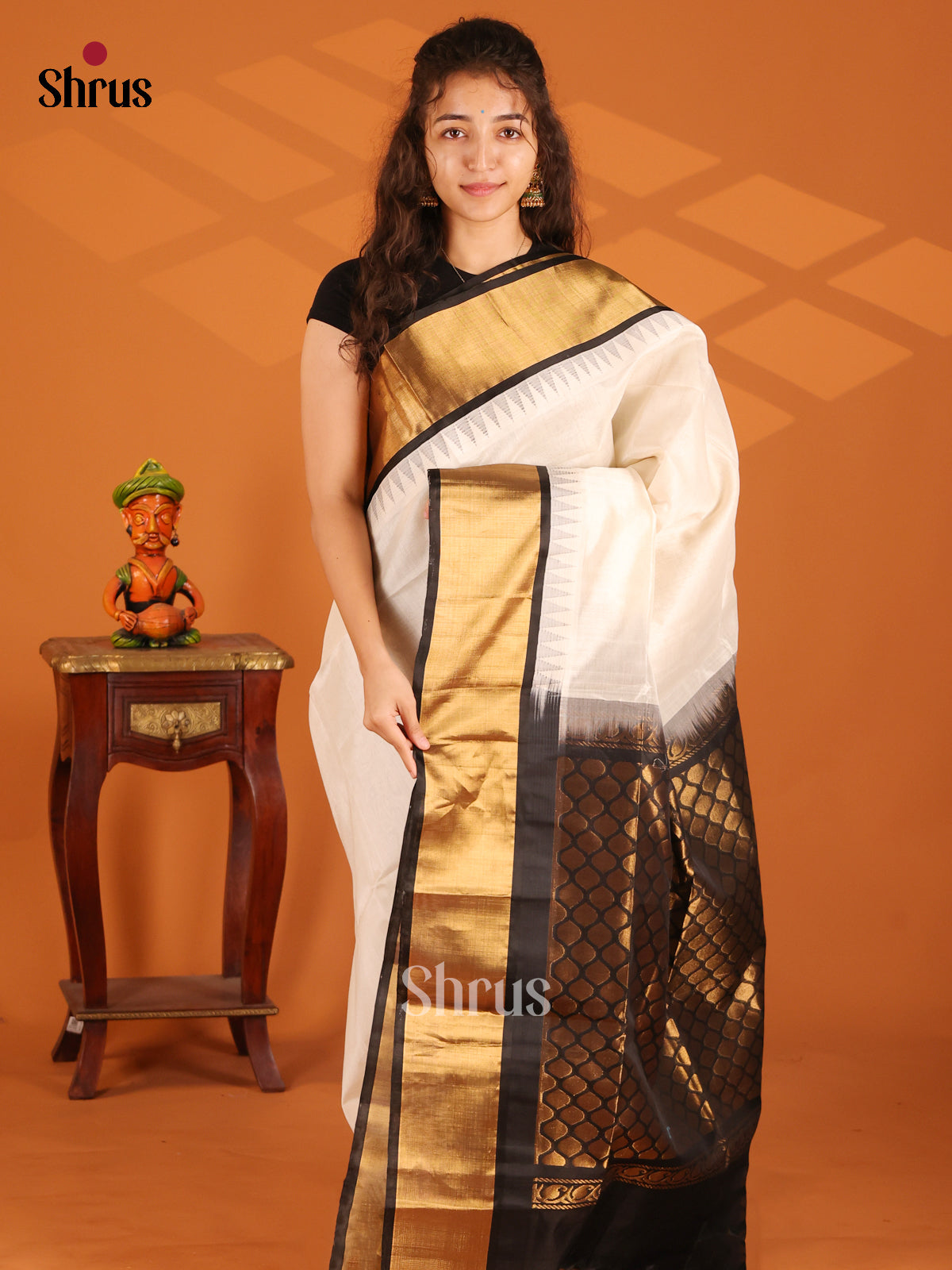 Pretty Cream Silk Cotton Saree with black kaddi zari border - Shop on Shrus.com