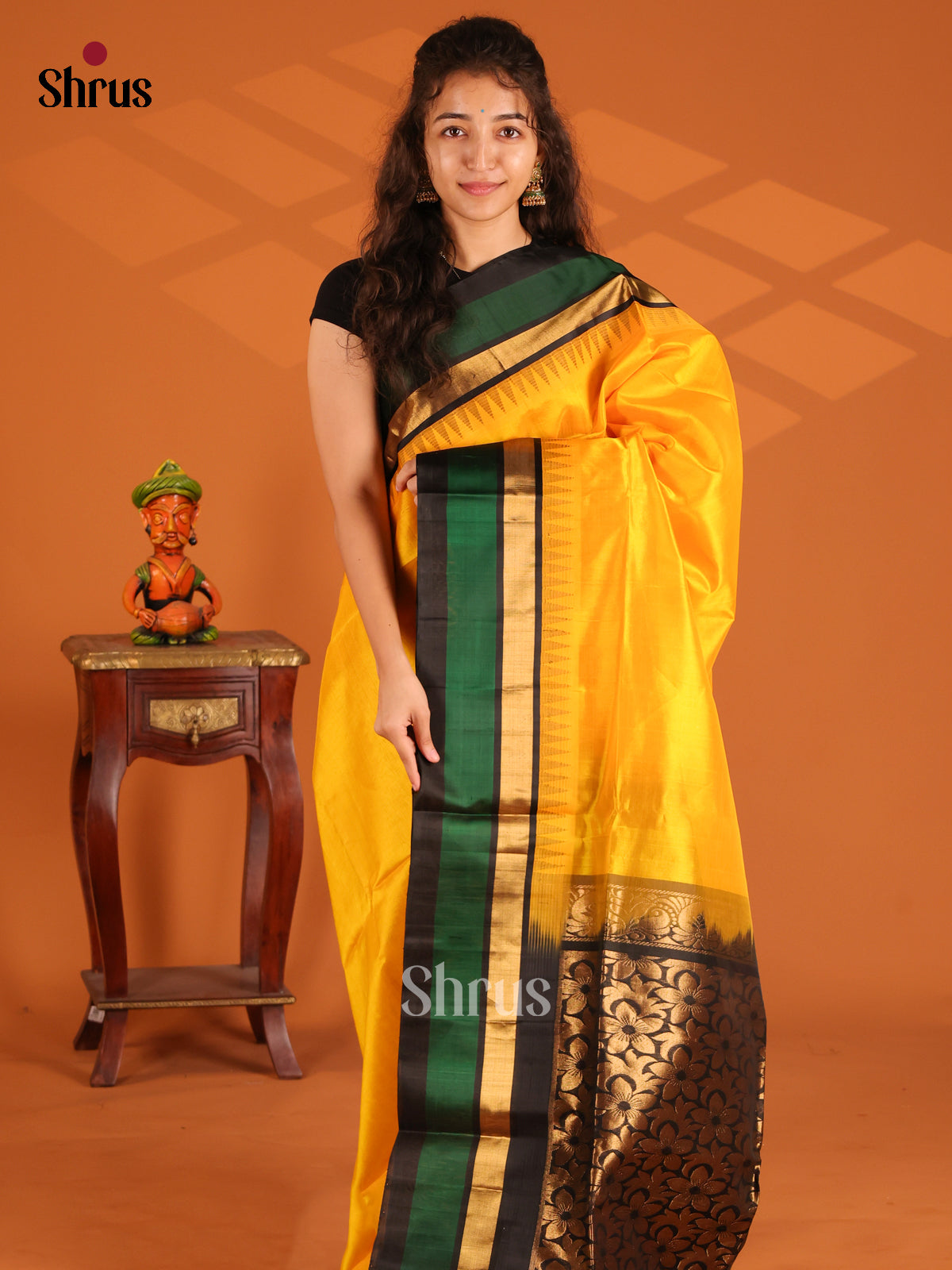 Glimmering Yellow Silk Cotton Saree with black floral brocade pallu - Shop on Shrus.com