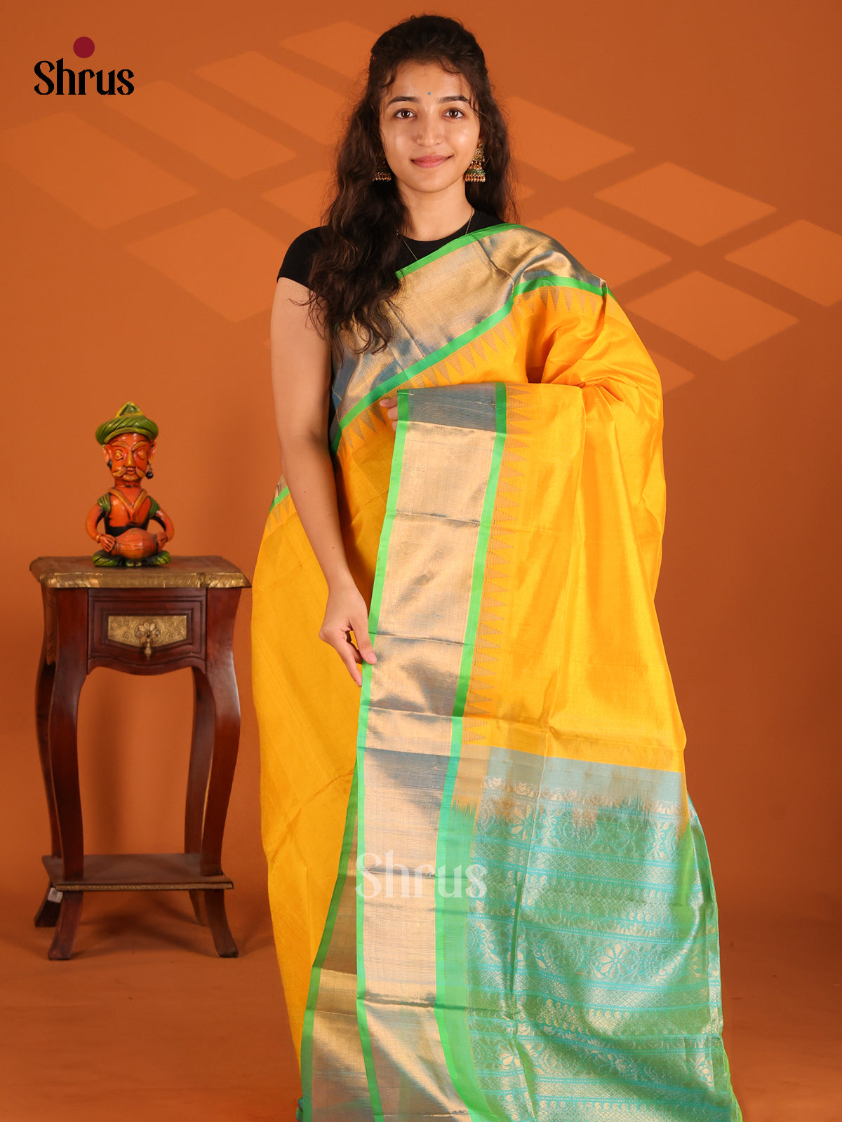 Bright Yellow Silk Cotton Saree with teal green floral brocade pallu - Shop on Shrus.com