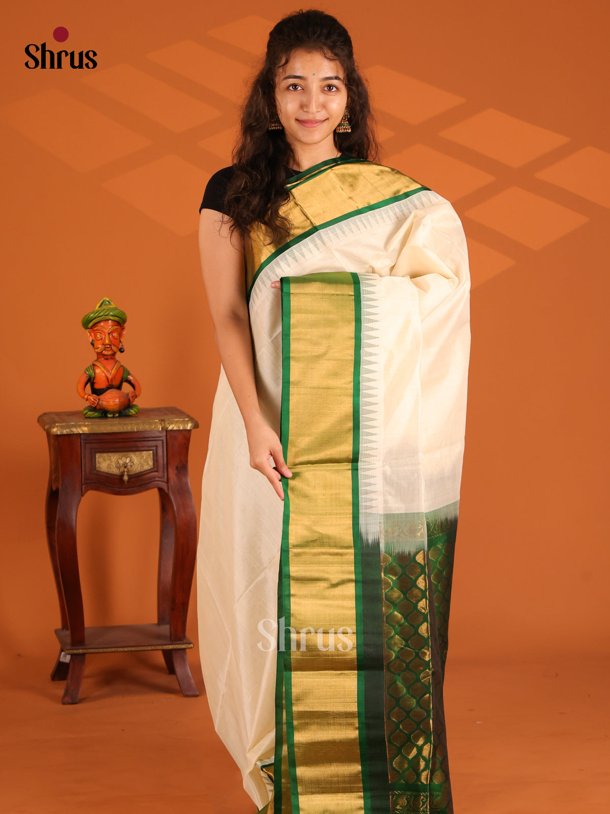 Classy Cream Silk Cotton Saree with contrast Green kaddi zari border - Shop on Shrus.com